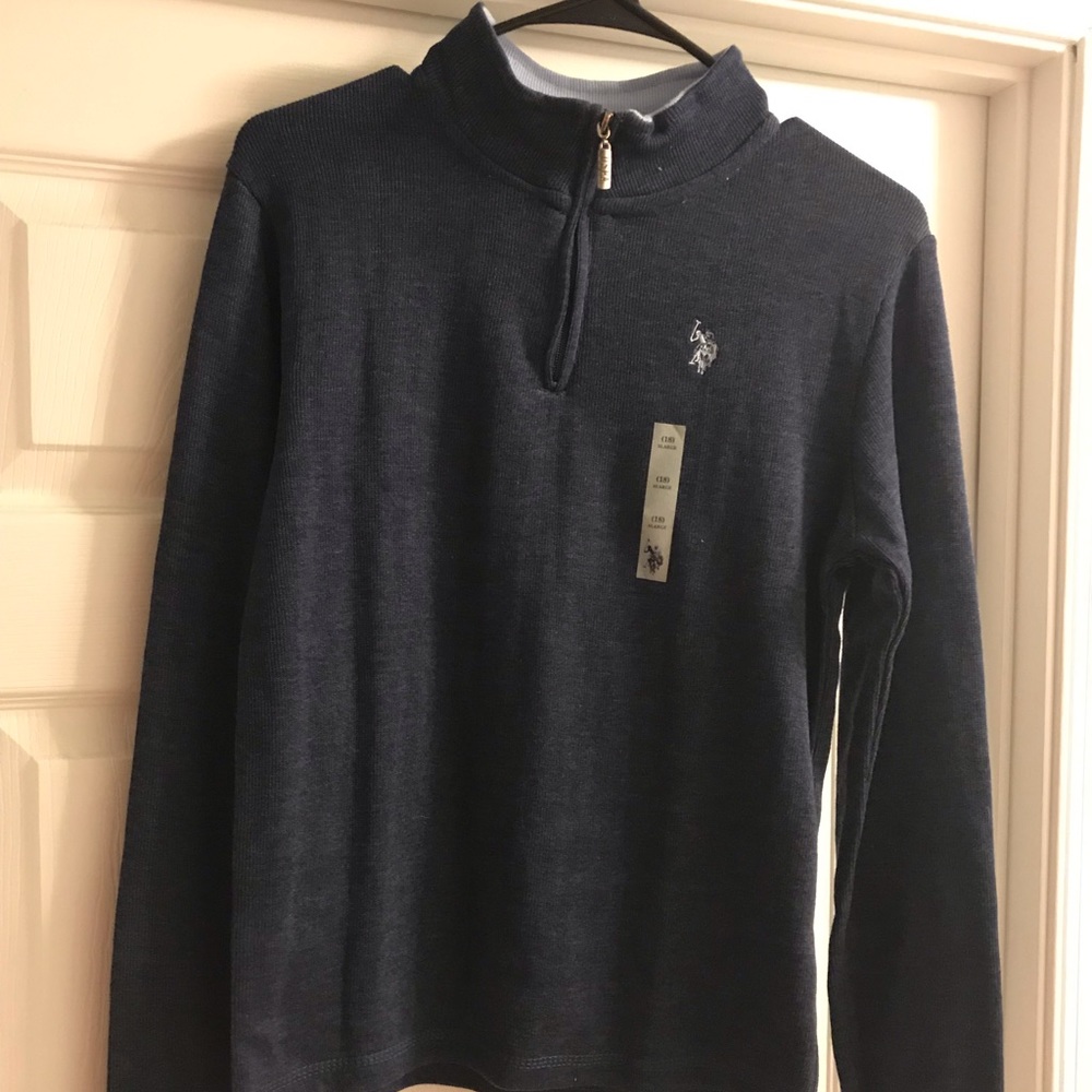 Turtle neck with zipper. New with tags.Size XL boy